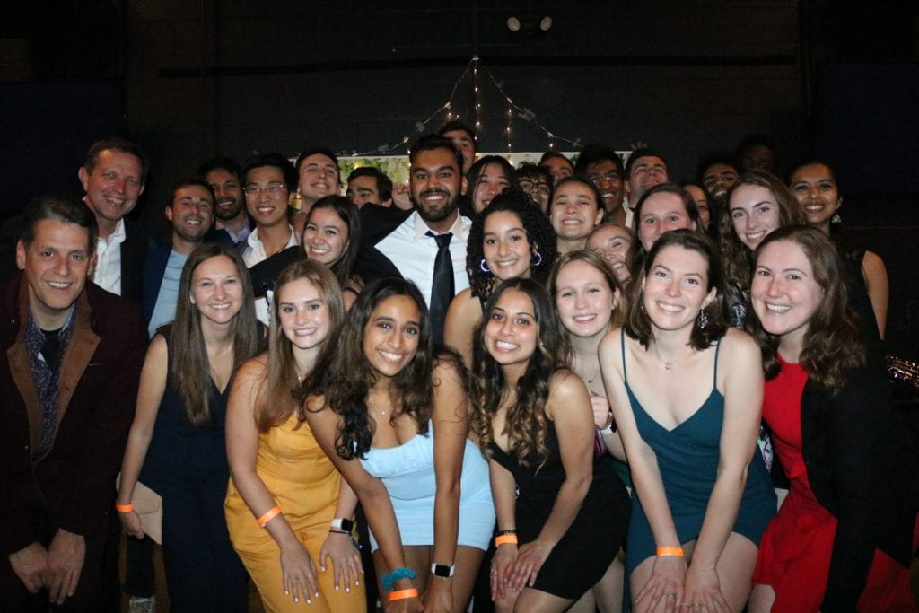 Cohort 34 posing for a group picture at QUEST Formal